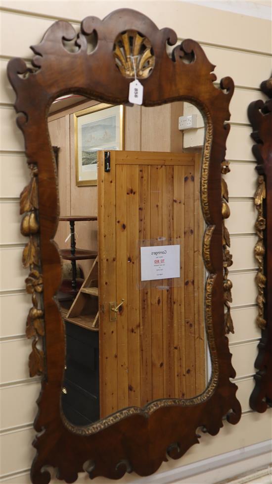 A George II style walnut and parcel gilt mirror H.110cm